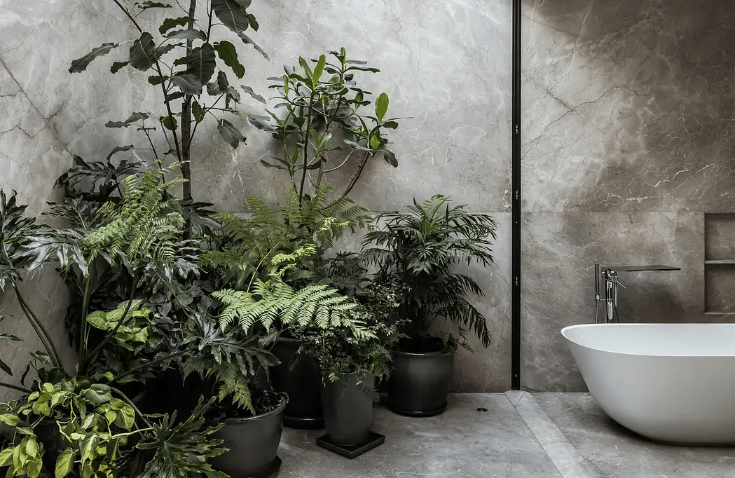 Gray Stone Bathroom With a Private Patio