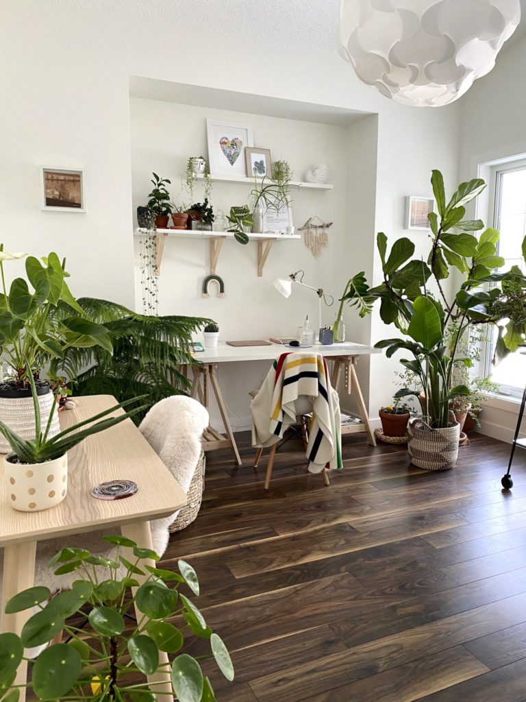 Scandinavian living room by incorporating some plants