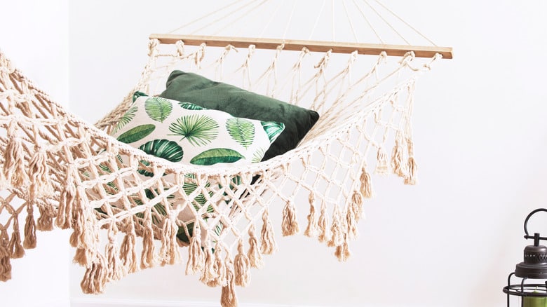 Sunny And Bright Bedroom With Natural String Hammock Plants And