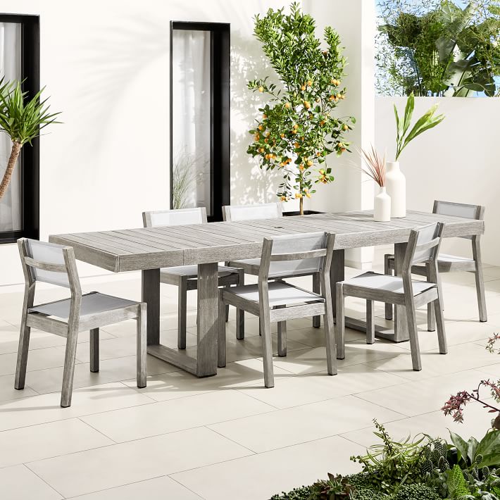 portside outdoor expandable dining table textilene chairs
