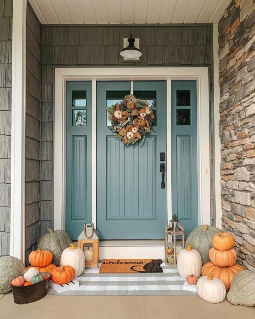 putting a funky fall wreath on the door