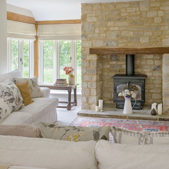 country living room with brick and stone walls