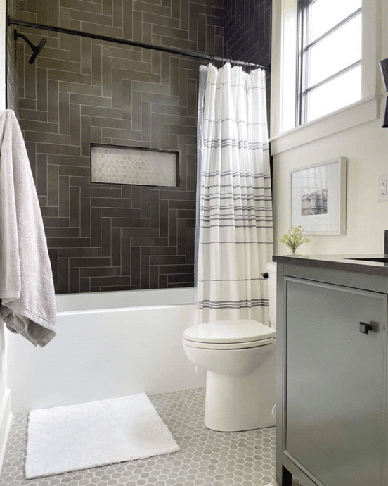 Bathrooms with Black Herringbone Tiles