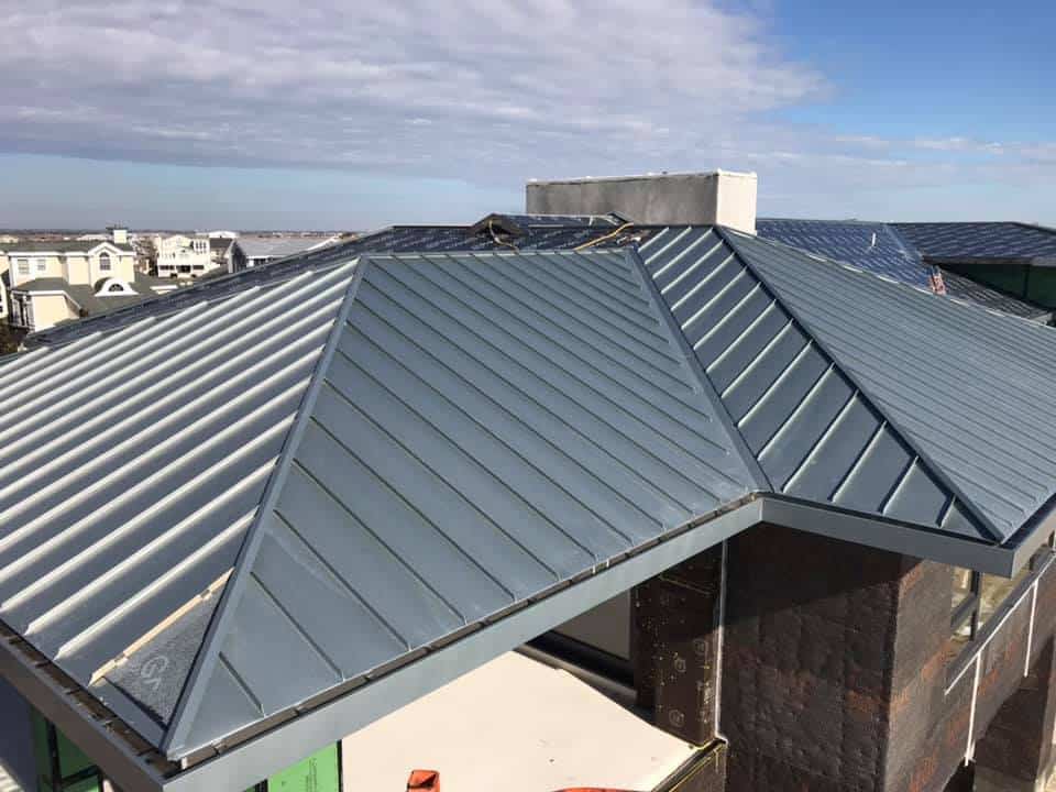 Metal vs. Slate Roofs: Which Roofing Material Prevails?