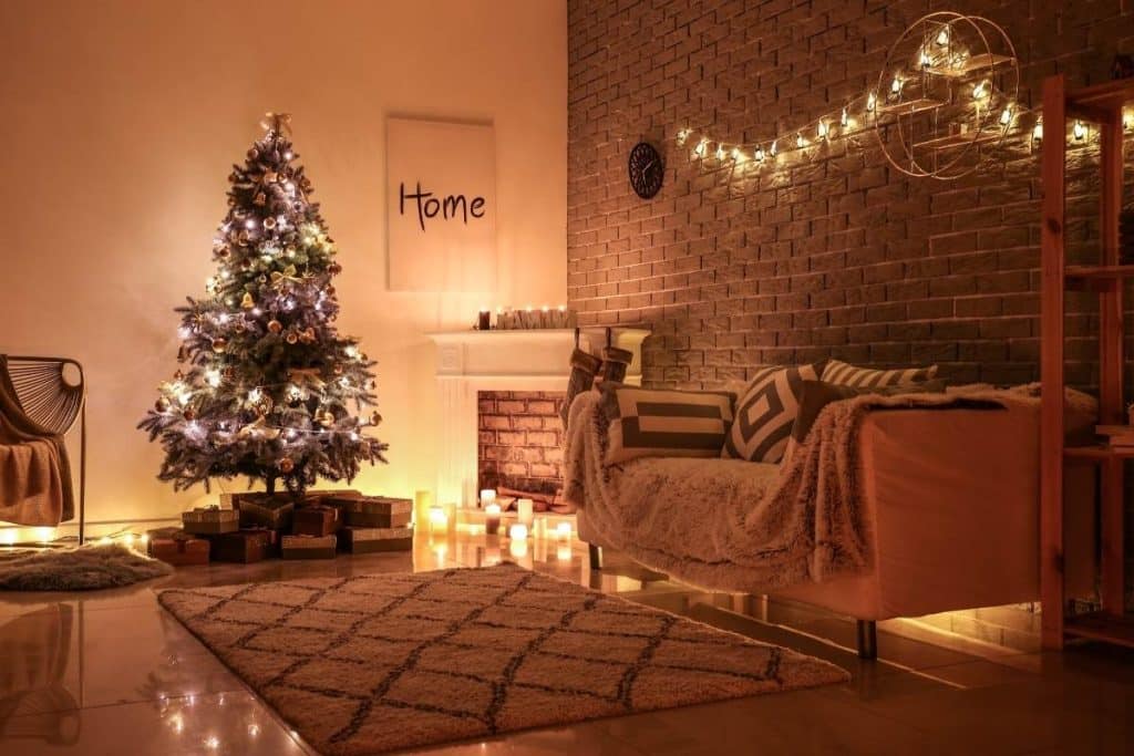 Festive living room with a Christmas tree and cozy couch in an interior setting