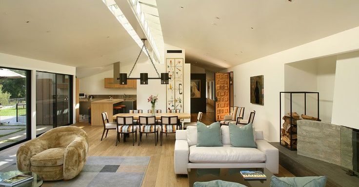 Lighting Features: A modern pendant light hanging from the ceiling, illuminating a room with warm, soft light
