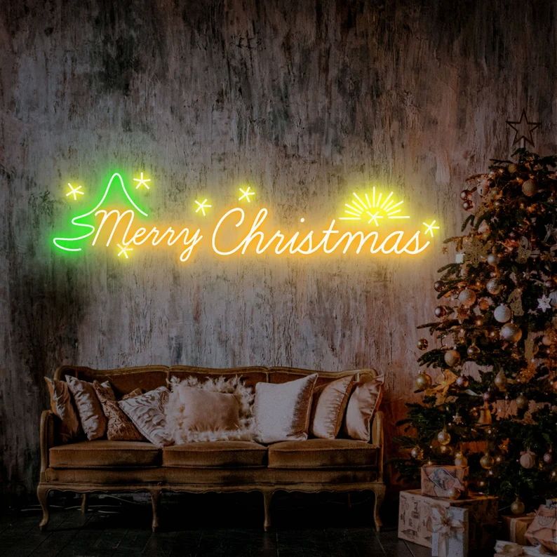 A vibrant neon sign that reads "Merry Christmas" in glowing letters against a dark background