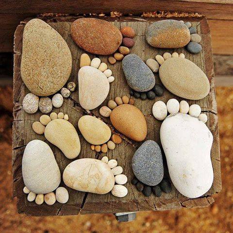 Wooden box filled with pebbles and stones