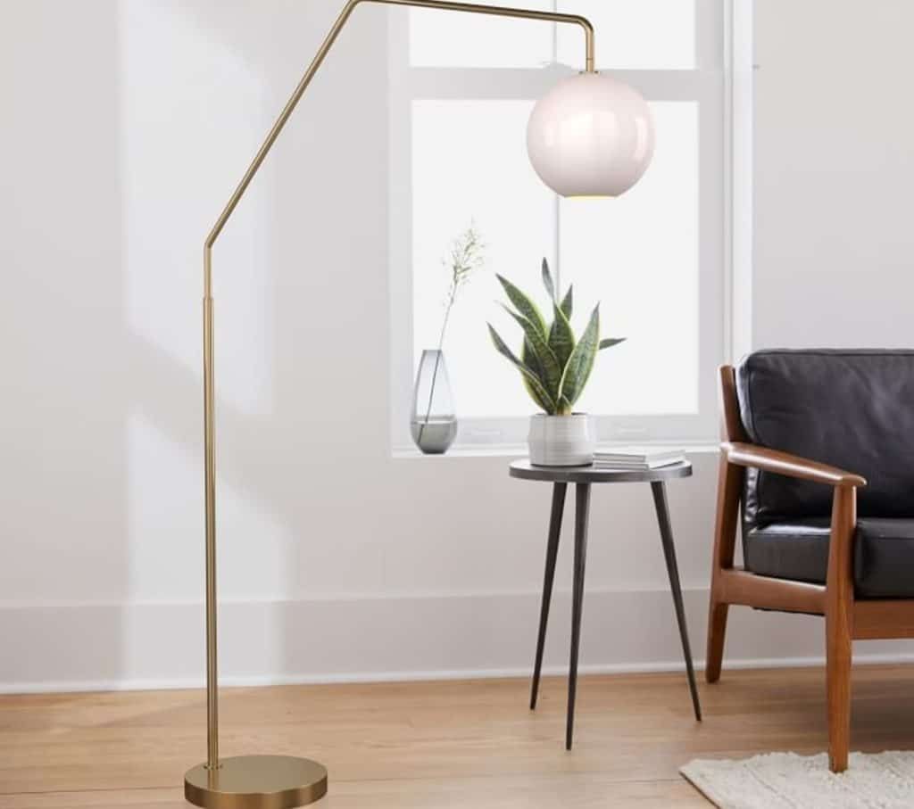 Brass Arc Lamps with Wooden Flooring