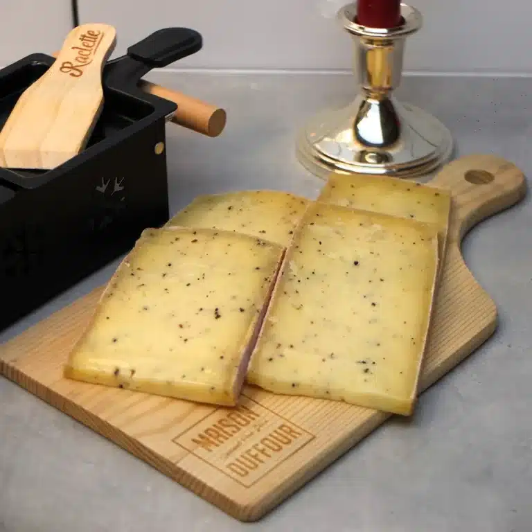 Gourmet Food Store Offers a Selection of Raclette Cheese for Sale